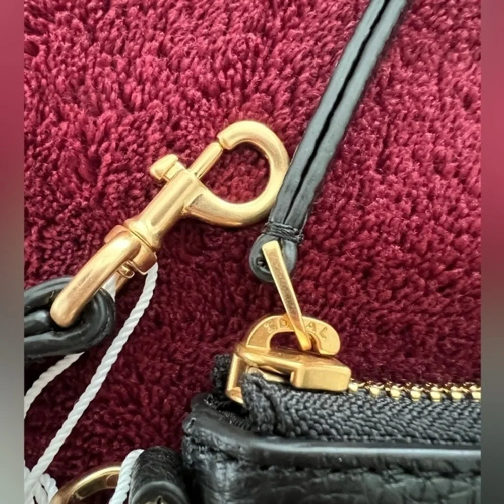 TORY BURCH• BRITTEN LARGE‎ ZIP POUCH WRISTLET